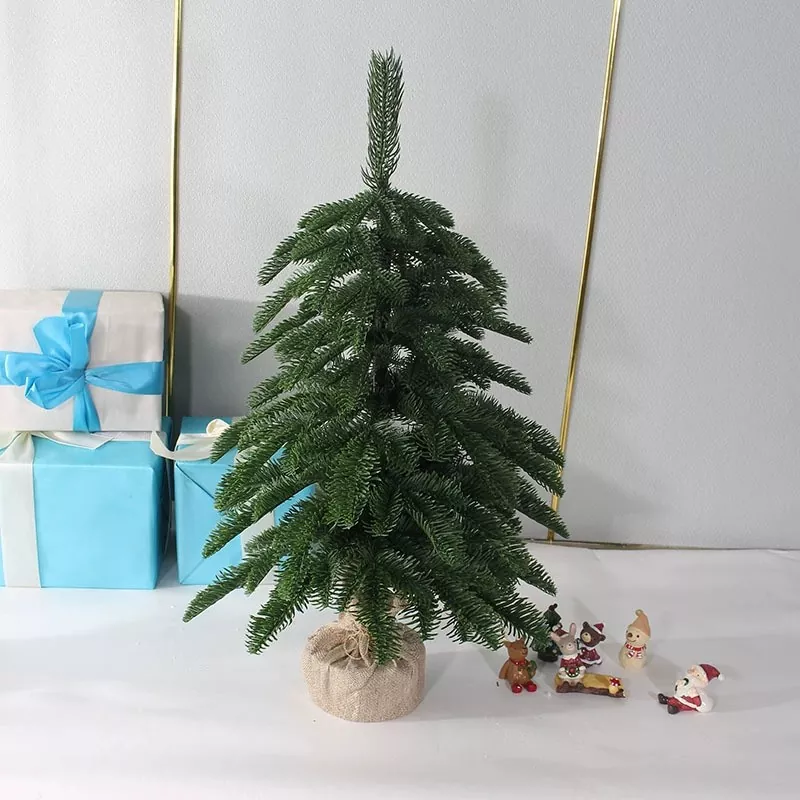 Bulk artificial snowy Christmas tree with wood base