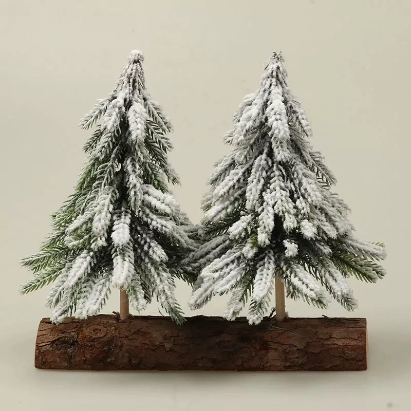Christmas tree with snowy tip and red berry accents