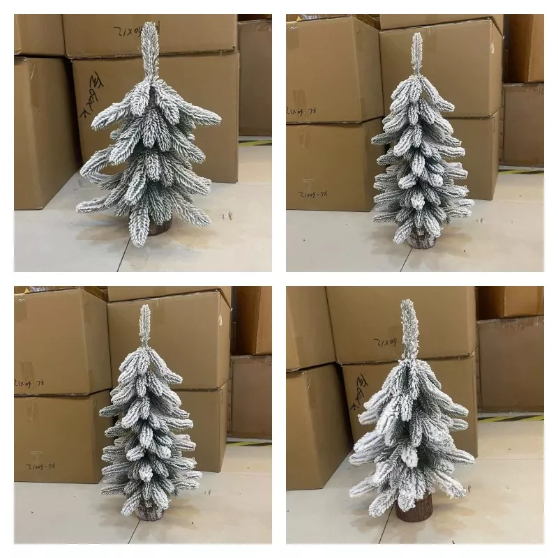 Mini holiday tree with white snow flocking